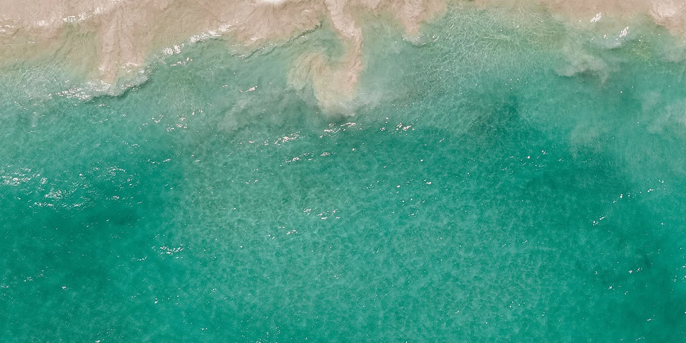 Playa de arena blanca y mar turquesa en Punta Cana